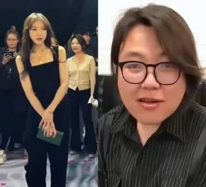 浪胃仙在直播画面中正面出镜,佩戴眼镜,鼻部特征明显,鼻孔大小不一,面部略显浮肿,背景为简易室内直播场景。