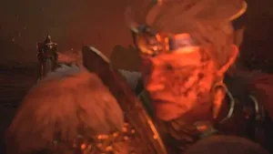 《暗黑破坏神4:憎恨之王》资料片官方预告片截图,画面中一名角色持剑站立于阴暗荒原,远处可见燃烧的城堡与悬浮的巨型恶魔头颅,整体色调以红黑为主