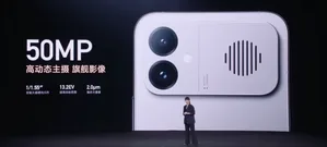 REDMI K90 Max手机正面特写,显示6.83英寸大屏,屏幕亮起呈现游戏界面,顶部居中挖孔前置摄像头,边框较窄,机身配色为深色渐变,底部可见品牌logo