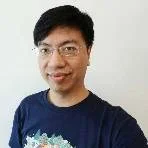 BGM游戏展广州站现场照片,展示展馆内多人聚集的试玩区场景,可见多台游戏设备、参展商展台标识及观众参与互动,背景有活动主题横幅和灯光装饰。
